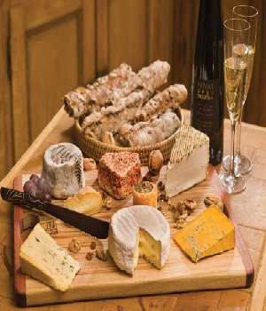 Kaasplankje met warme Halloumi en geroosterde paprika's